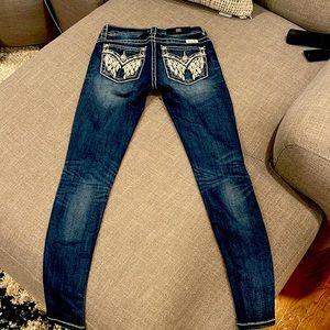 “ MISS ME” mid rise skinny jeans   Size 25 waist.